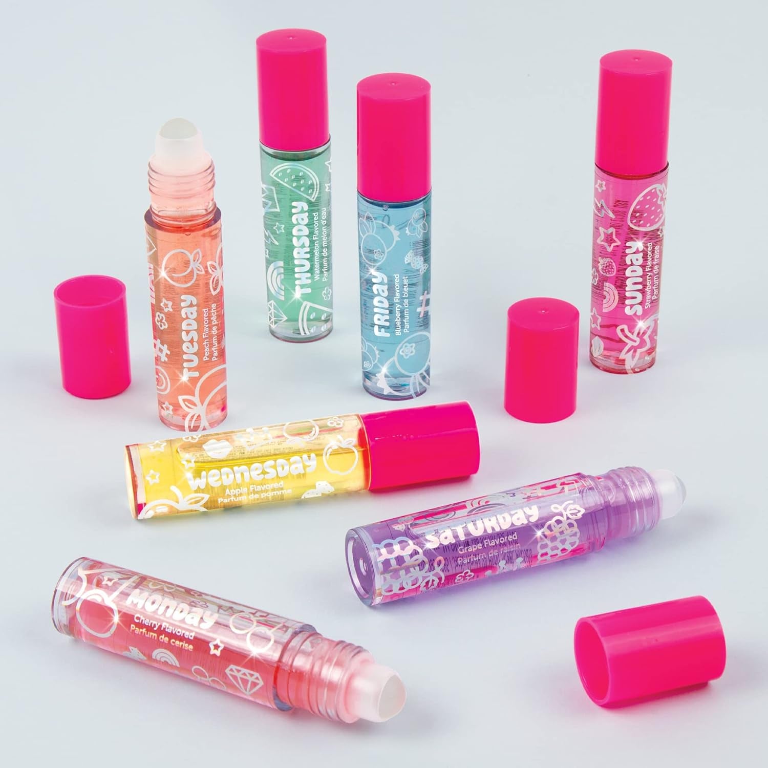 3C4G Days of the Week Lip Gloss Set - 7 Pack Kids Lip Gloss Kit - Clear Flavored Roll on Lip Gloss for Girls & Teens